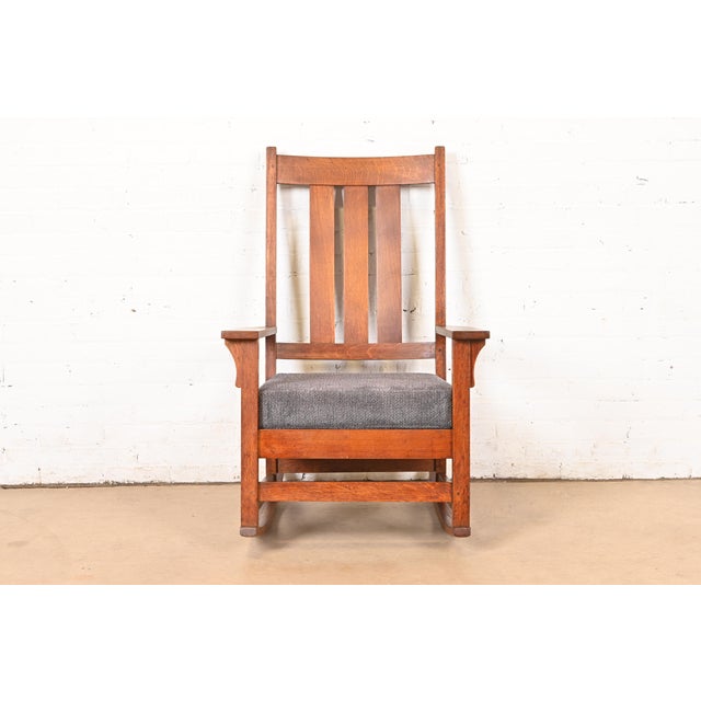 A gorgeous Mission oak Arts & Crafts rocking chair By Gustav Stickley (signed with red decal) USA, Circa 1910 Solid...