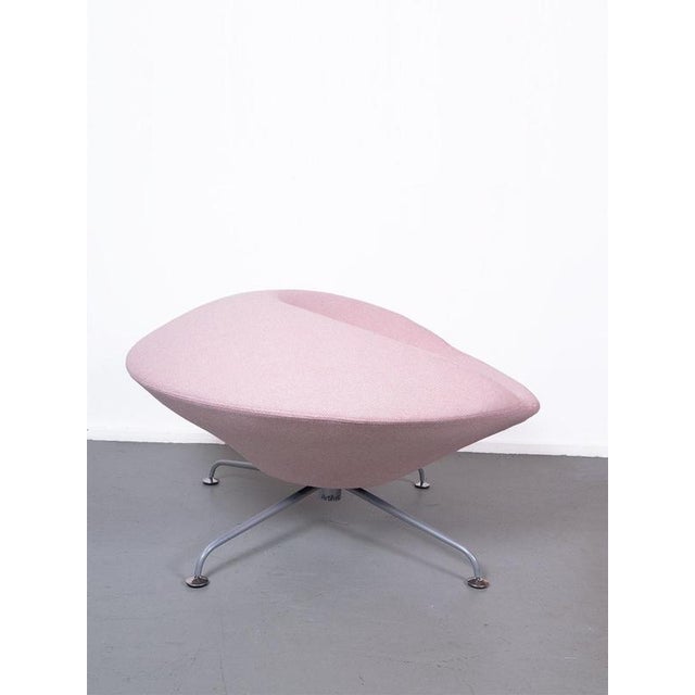 Newly upholstered in sorbet pink, the Kirk chair by Artifort, designed by Rene Holten. As the chair does not have a high...