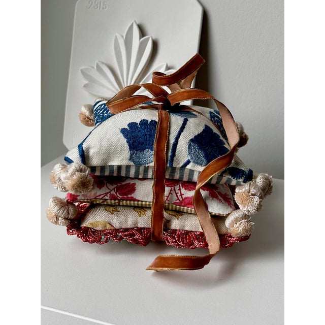 Set of three decorative pillows filled with fragrant dried lavender. Pretty enough to display, then can also be tucked...
