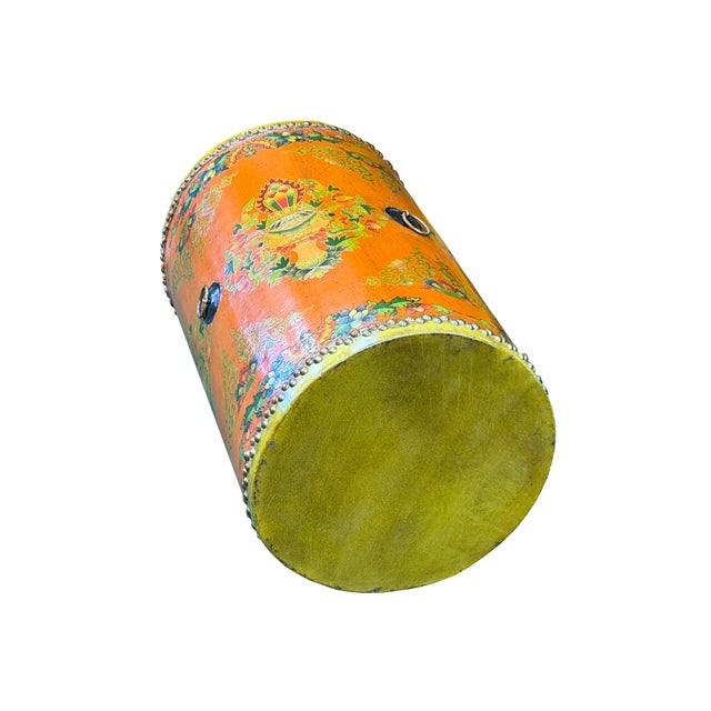 Elevate your interior decor with this exquisite, hand-crafted Tibetan-style drum stool—a masterful fusion of traditional...