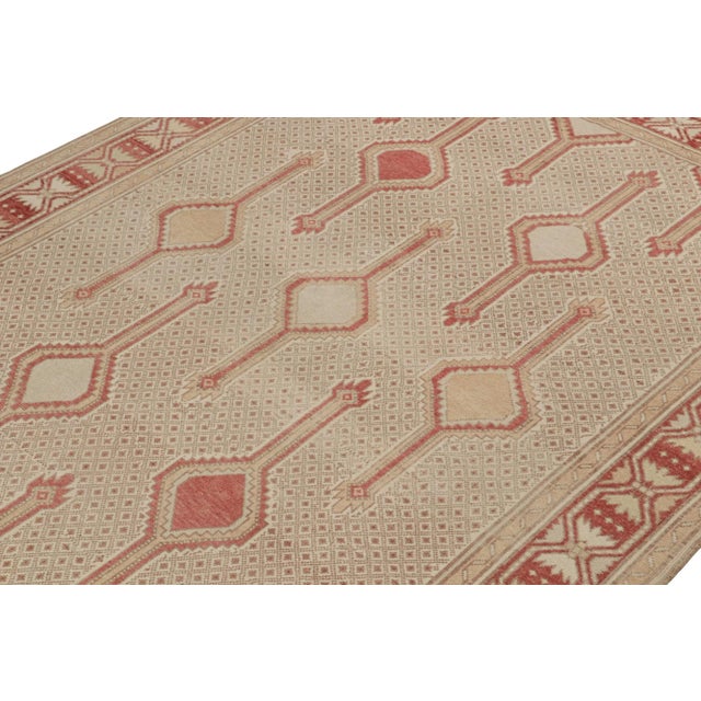 Hand-knotted in wool circa 1950-1960, this 9x13 vintage Persian rug is believed to be of Sarab Malayer provenance. On the...