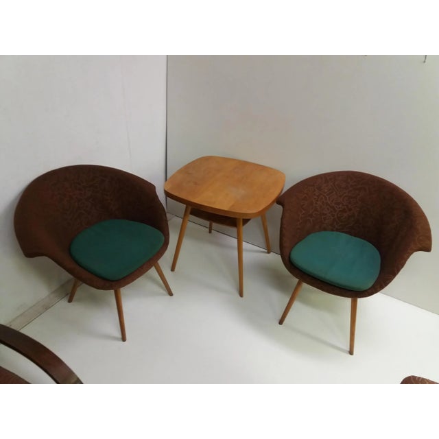 Wooden base, laminate upholstered shell. Wooden veneered coffee table. Designed for the Expo 58 exhibition in Brussels. -...