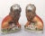 A handsome pair of English Staffordshire pottery decorative animal sculptures, finely modeled and colored as lions with...