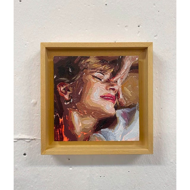 This intimate portrait captures a moment of serene introspection, with soft brushstrokes conveying the warmth and...
