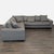 This spacious sectional by Rene Cazares features a stylish gray fabric and a modern design. The sofa includes wide...