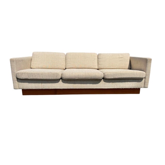 Elevate your space with this striking Mid-Century Danish Modern sofa and loveseat set, showcasing clean architectural...