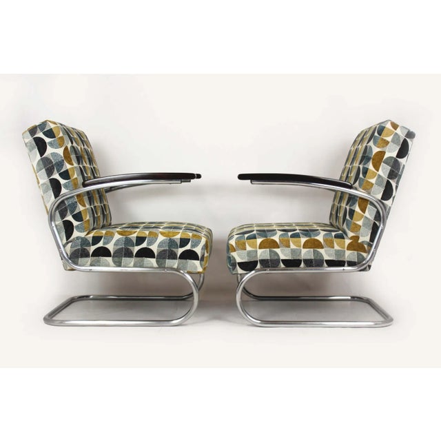 Set of two Bauhaus style cantilever S411 armchairs designed in the 1930s by Willem Hendrik Gispen and manufactured by...