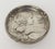Small Art Nouveau style pewter plate or trinket dish depicting a profile of a young woman surrounded by undulating water...