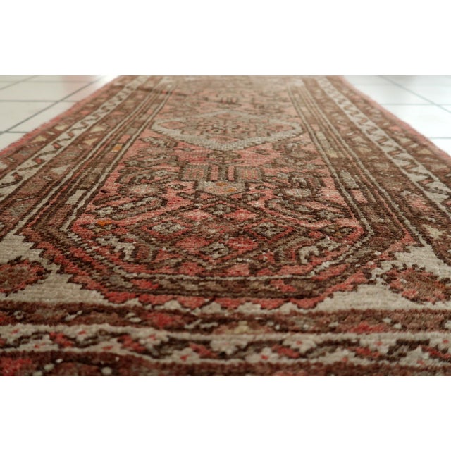 This authentic vintage rug hails from the Hamadan region of Western Persia, one of the world's oldest and most prolific...