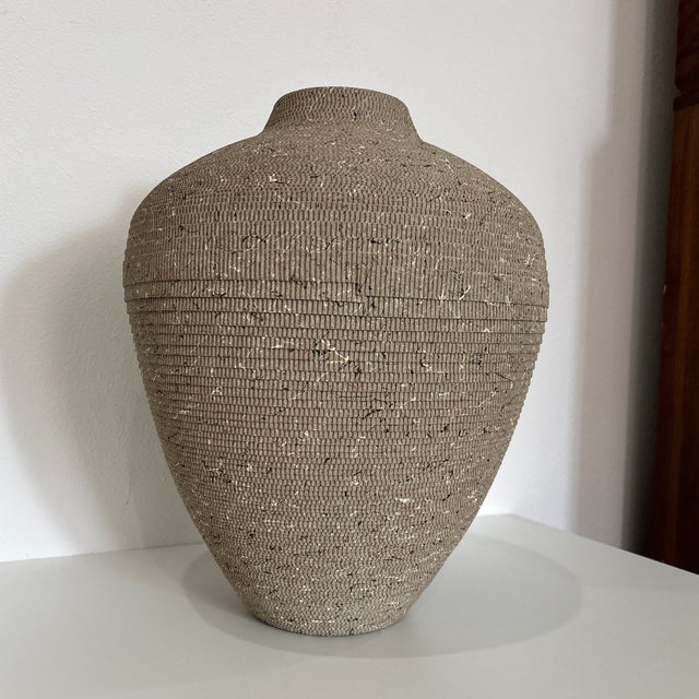 This piece represents a definitive example of 1980s American Postmodern design, turning industrial, disposable packaging...