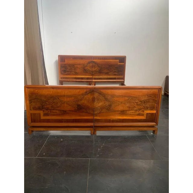Rationalist bed, walnut, walnut burl and maple. The lines that resume the drawings of Marcello Piacentini and Giuseppe...