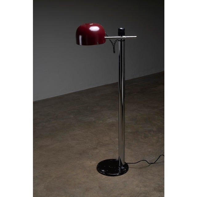Introduce a touch of elegance and sophistication to your space with the Chrome & Bordeaux Floor Lamp by Enrique Franch for...