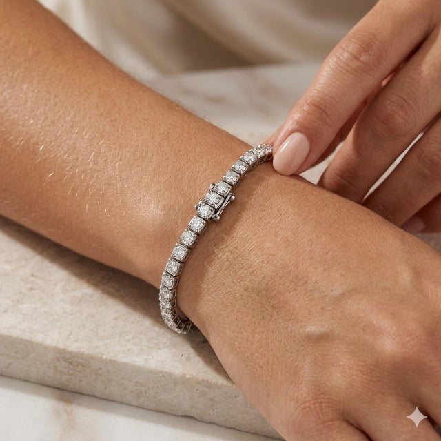 14k White gold straight line bracelet with 56 round brilliant diamonds weighing 5.72 carats. 17.24 grams