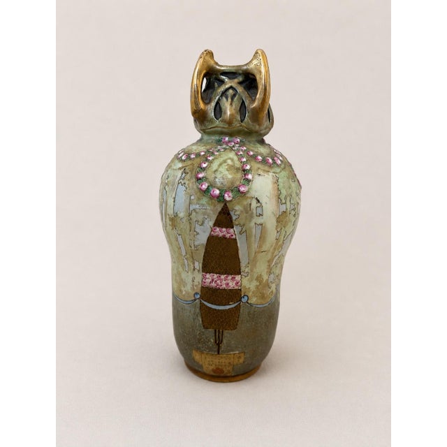 An exquisite hand-painted Art Nouveau vase by Turn-Teplitz of Bohemia, dating to the early twentieth century and...