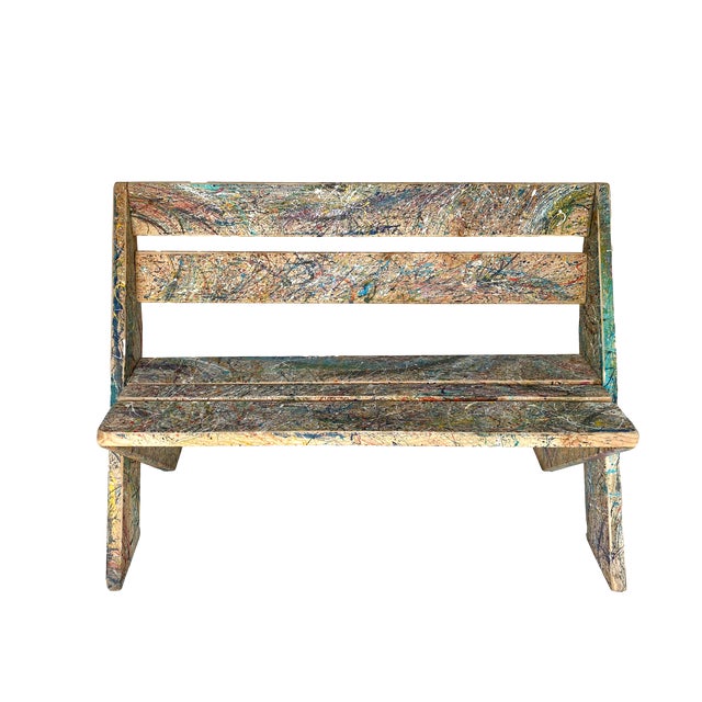 Wood bench crafted by an Austin artist with X legs and featuring a graffiti/artists' palette finish. Sturdy and does not...