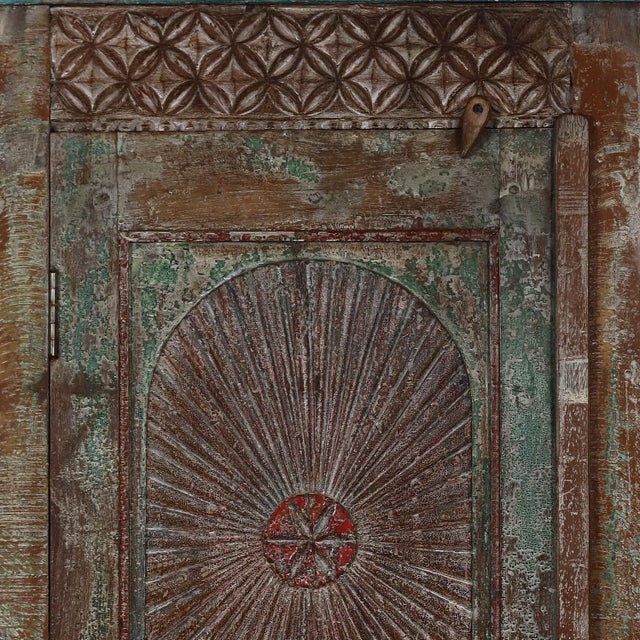 Armoire constructed from an Antique Indian Painted Teakwood Door and Elements, with a beautiful old painted patina and...