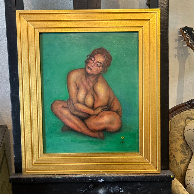 Striking oil painting on board of a female figure seated in the nude signed in the lower right Guy Hoff, and presented in...