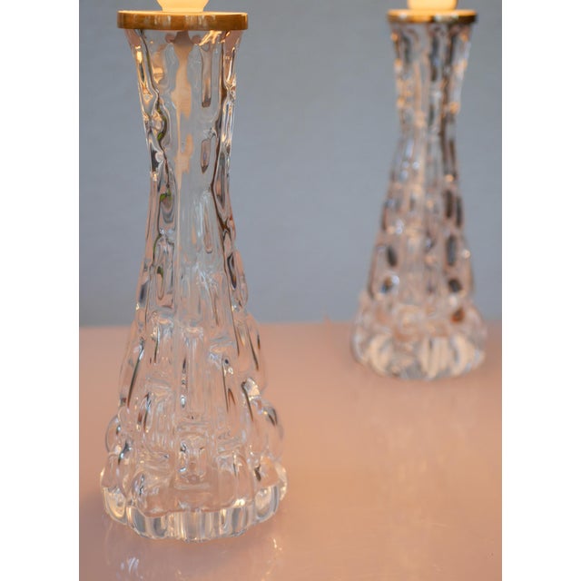 An exceptional pair of crystal glass table lamps, model rd 1477, designed by carl fagerlund for the prestigious swedish...