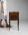 Carved walnut side cabinet in Rich Walnut Brown. The rich walnut brown surface highlights fluted styles, single drawer...
