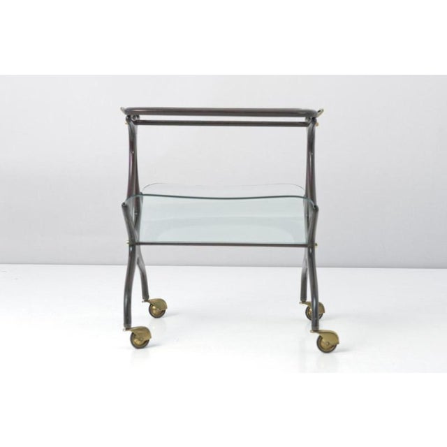 Article Number: 1647 Side Table on Castors Designer: Cesare Lacca Year: around 1955 Manufacturer: Cassina Country: Italy...