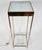 A lighted 2 tier brass display stand or pedestal in the Style of Maison Jansen. Top shelf milk glass, bottom shelf clear...