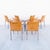 Set of eight suede dining chairs by Roberto Barbieri, made by Zanotta in Italy in 2005. The "Lia" chair consists of a...