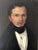 This antique vintage oil portrait painting from the 19th century shows a Dutch gentleman formally dressed. He wears a...