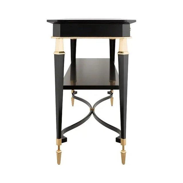 A refined custom-made console table by Decca Furniture, Paris, executed in 2017 in an elegant contrast of deep brushed...