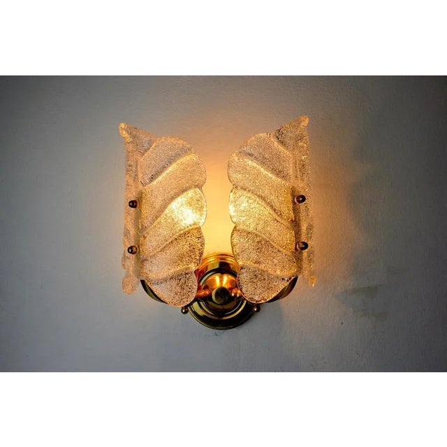 Beautiful leaf shaped wall lamp by Carl Fagerlund dating from the 70's, produced in murano italy. Structure in gilded...