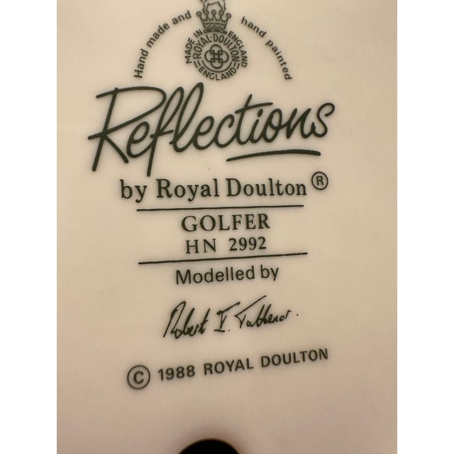Royal Doulton "golfer" 9.25" tall part of reflection collection, designed and signed by Robert I. Tabbenor, hand made and...