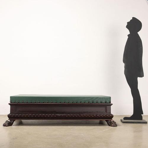 Neo-Renaissance style coffee table with padded top covered in skai fabric fixed with studs, 20th century Italy. Lower...