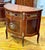 Bring timeless French elegance into your home with this magnificent Louis XVI-style demilune sideboard cabinet. Crafted...