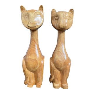 A Pair of Hand Carved Wooden Cats in Mid Century Modern Style For Sale