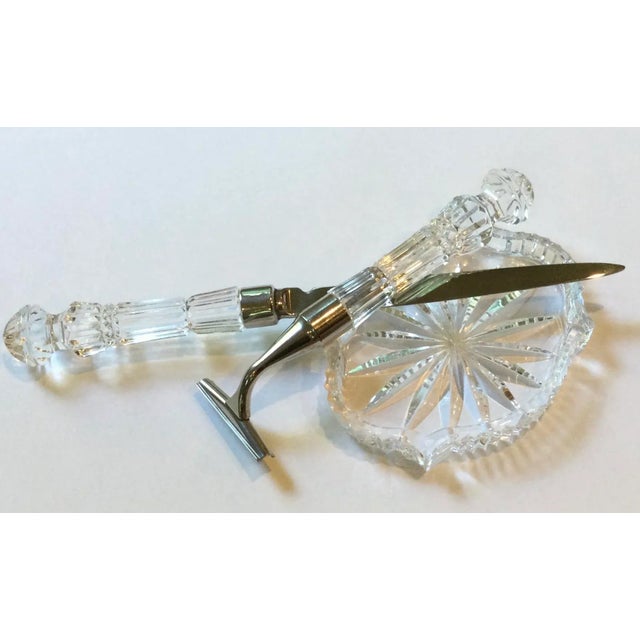 This Waterford vanity set is another exquisite estate find. It contains a petite crystal dish perfect for jewelry or cuff...