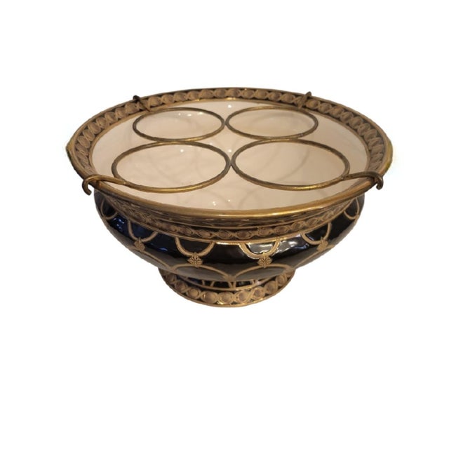 A gorgeous Royal Doulton style ceramic decorative bowl/wine holder. The bowl is extremely versatile as it can be used as...