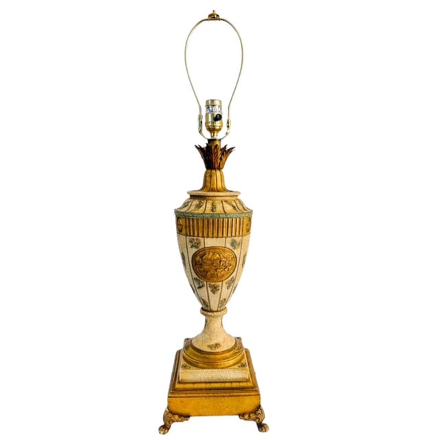 Pair of vintage Neoclassical urn table lamps cast in heavy composition resin, each lamp displays an oversized amphora-form...