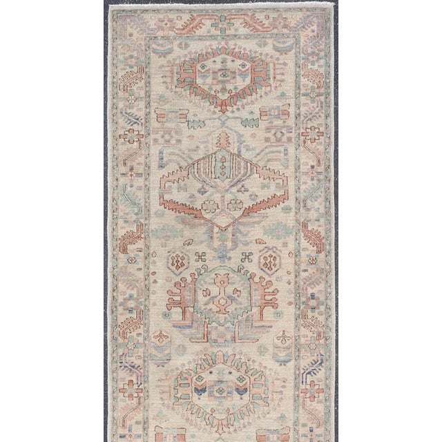 Measures: 3'1 x 12'0 Afghanistan Heriz-Serapi Runner with Ivory Field and Soft Green Accents. Keivan Woven Arts /...