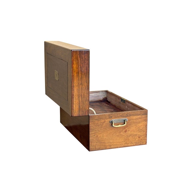 Vintage rectangular trunk featuring a beautiful natural wood grain pattern in a light brown gloss finish. Equipped with a...