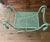 Italian Regency Style X-Base Bench with Rope and Tassel Detail in Moss Green A charming X-frame vanity bench or window...