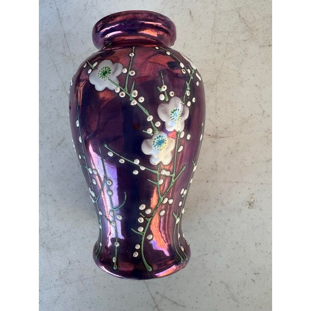 Art Deco 1920s purple vase with a iridescent Lusterware shine. Measuring 5” tall . Marked on the bottom. Made in Japan....