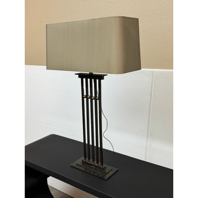Design Plus Gallery presents a Sculpted Iron Craftsman Table Lamp by Tanner Kenzie. This timeless lamp is an iconic piece...