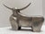 Silver toned chrome or metal bull decor accent. Whimsical retro and classic design.
