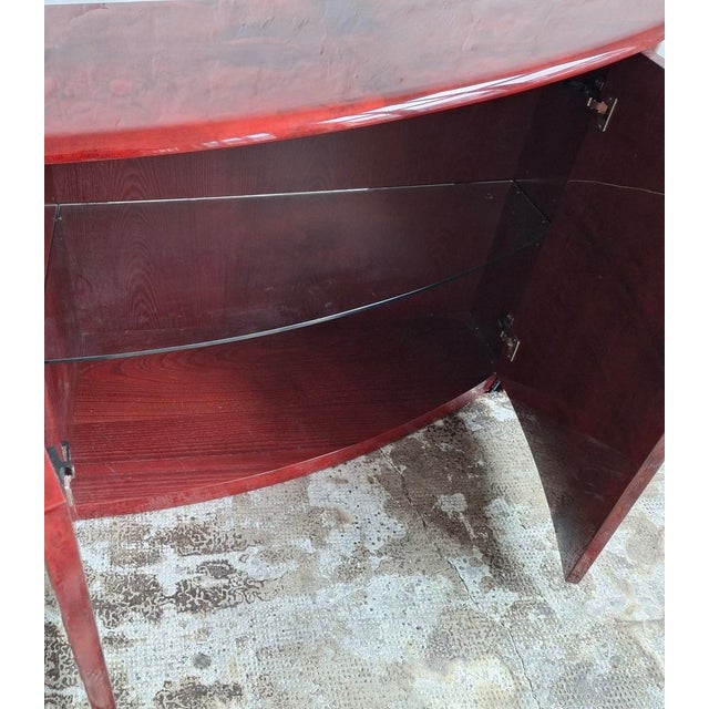 Rare sideboard by Italian designer Aldo Tura, elegant convex shape on a wood frame.The sideboard is covered with goatskin,...