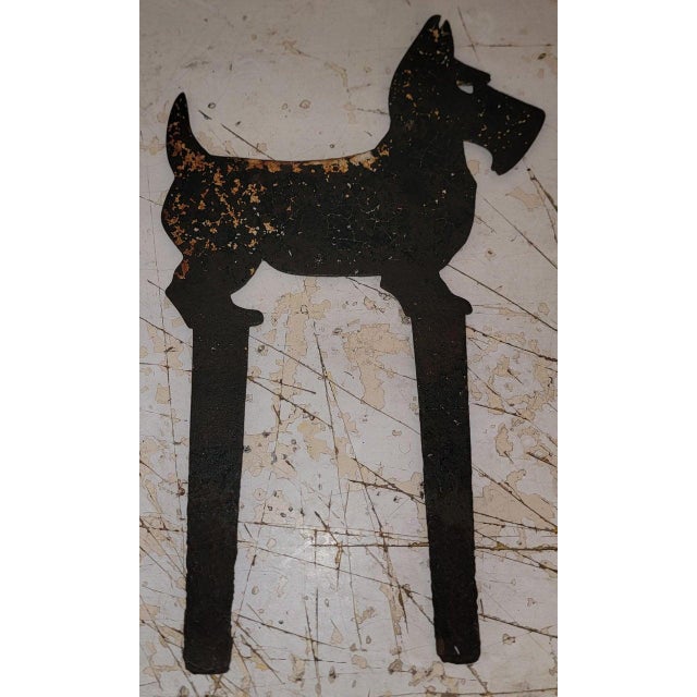 Front Leg Is stamped - "COPYRIGHTED 1927 DY" Back Leg Stamped - "HOUSEHOLD PATENTCO NORRISTOWN PA" Cast iron Scottie Dog...