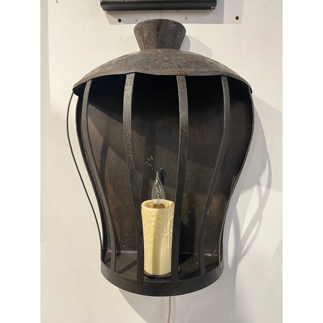 Antique Hand Forged Wrought Iron Sconces. Beautiful Urn or balloon shaped open cage design. One of a kind early 1900's...