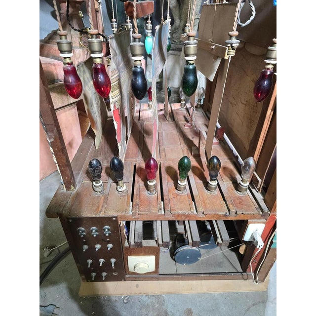 This important and rare automaton theater dates from the late 19th century and features both its original mechanical...