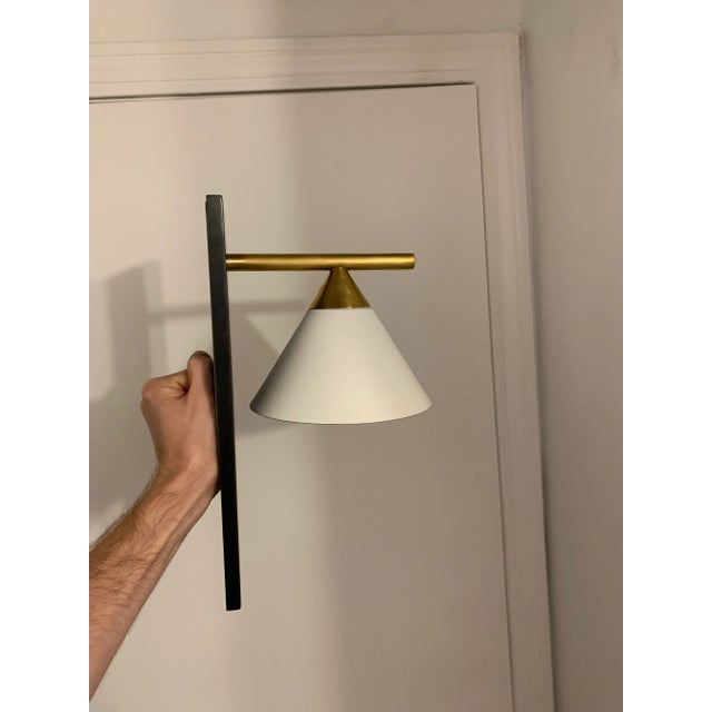 Cleo Sconce in Bronze and Antique-Burnished Brass with Matte White Shade for Visual Comfort.