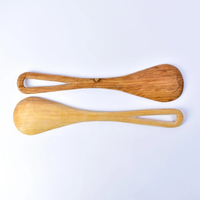 A set of wood hand-carved spoons. Made throughout eastern Africa where renewable and sustainable deciduous tree resources...