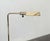 Rare floor lamp by Cedric Hartman, produced in Switzerland for Jack Lenor Larsen. The design impresses with its...