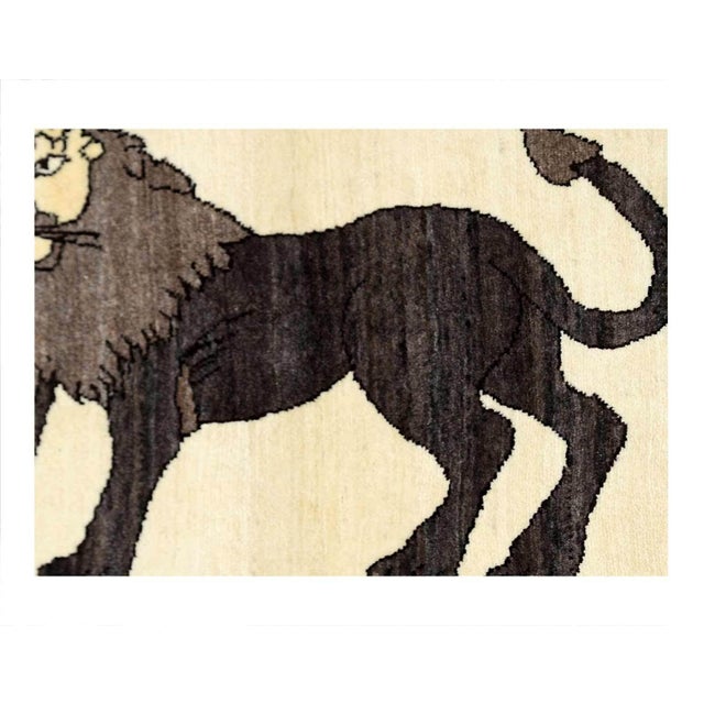This GabbehLion carpet is Kashkouli style weave. Highlighting the powerful imagery of a prowling Lion, the carpet's...